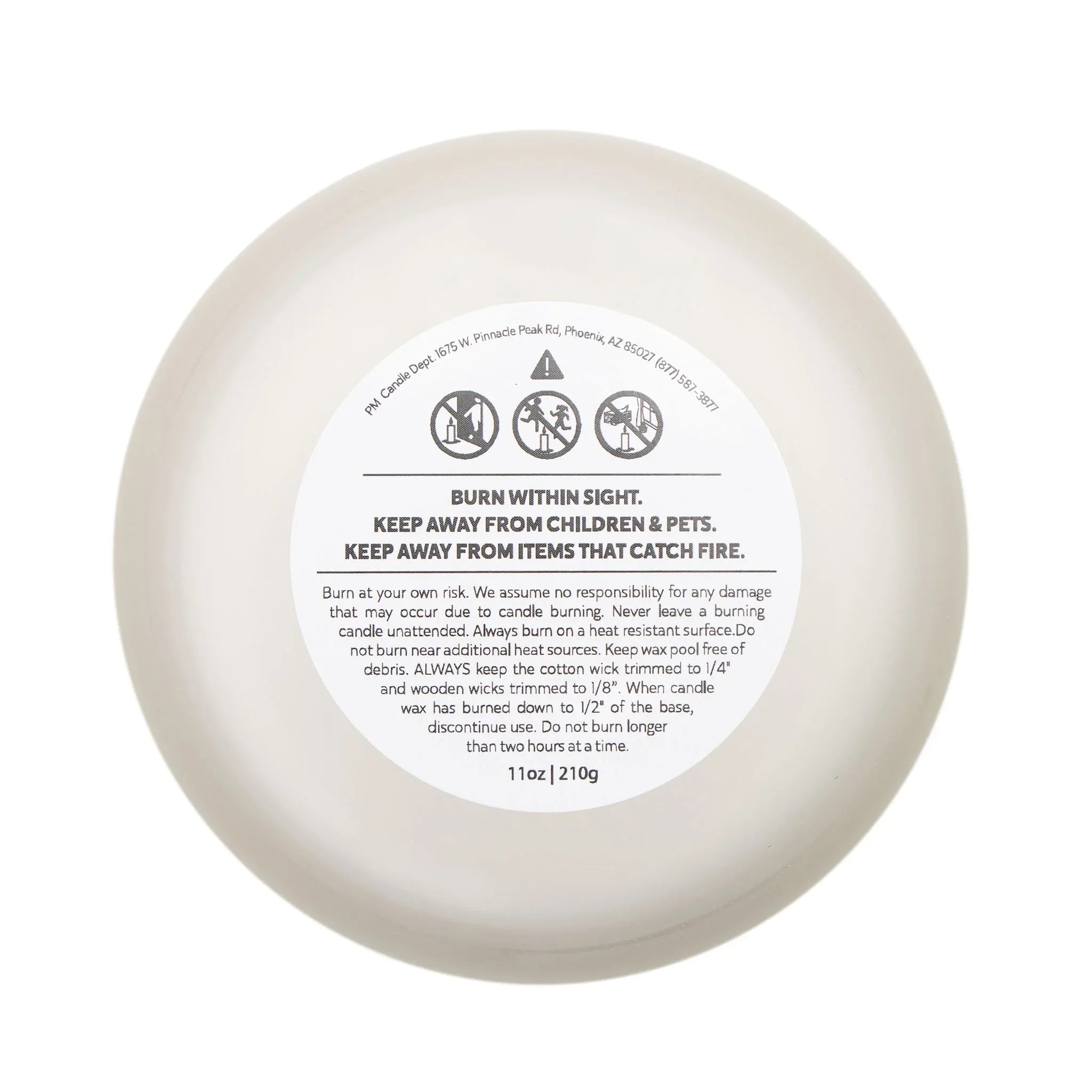 Bottom view of a Retirement Gift Candle showing safety instructions and burn guidelines.