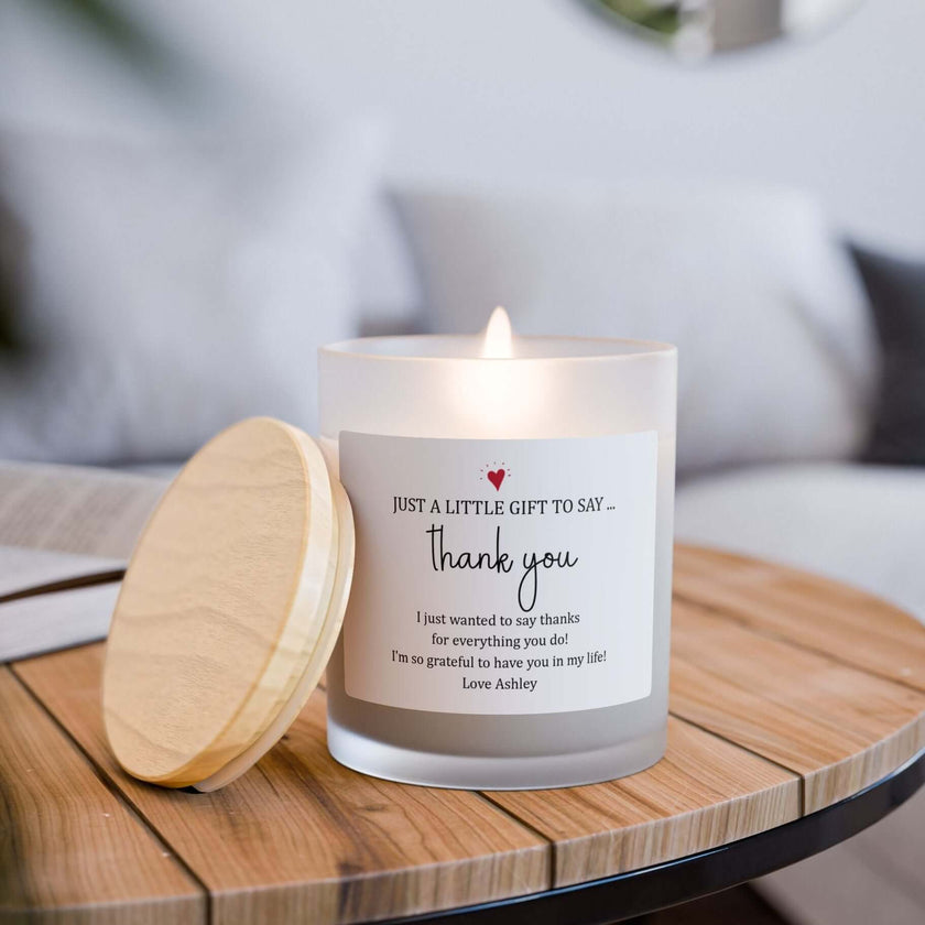 Thank You Candle — Frosted Glass 11oz Gift Candle on a wooden table, softly lit with a heartfelt message of gratitude.