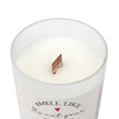 Retirement Gift Candle with playful retirement message and wooden wick in frosted glass vessel.