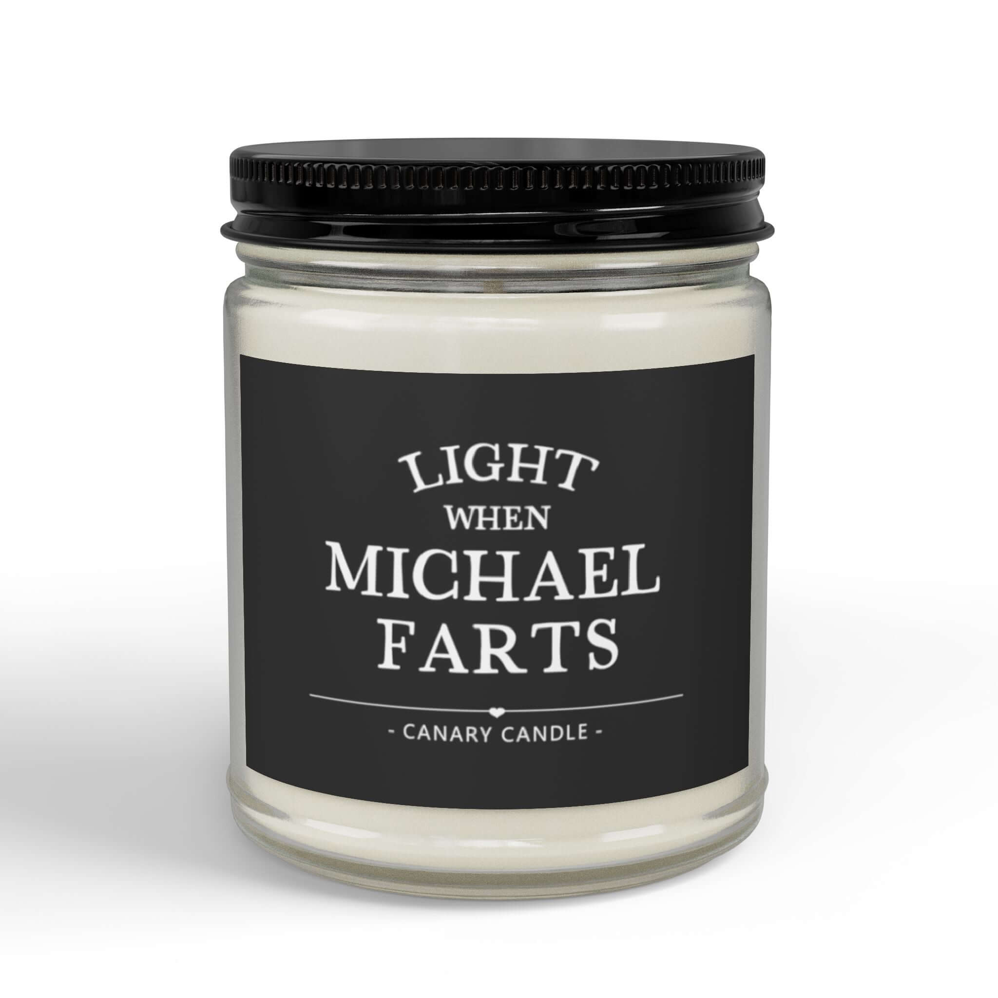 Funny personalized candle in a glass jar, labeled 'Light When Michael Farts', perfect for humor and warm ambiance.