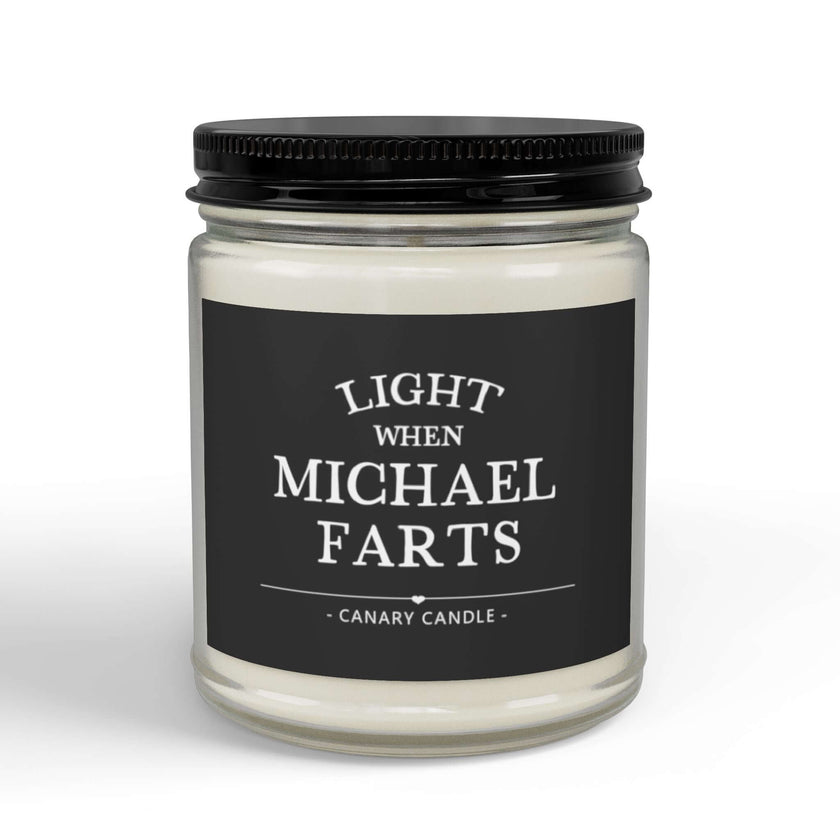 Funny personalized candle in a glass jar, labeled 'Light When Michael Farts', perfect for humor and warm ambiance.