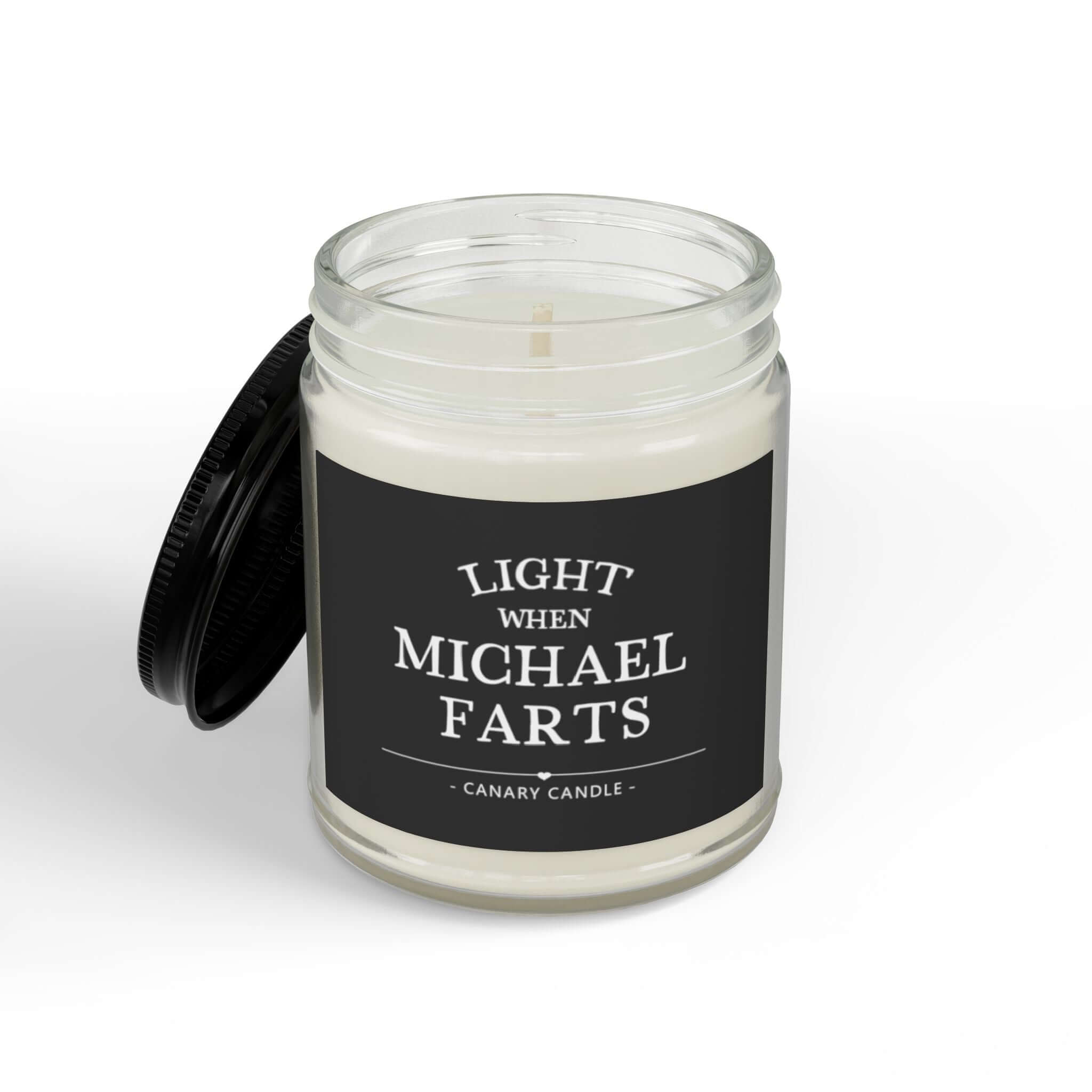 Funny personalized candle with a humorous label that says 'Light When Michael Farts' in a glass jar.