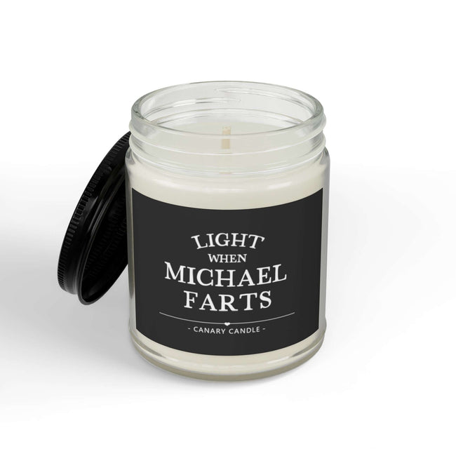 Funny personalized candle with a humorous label that says 'Light When Michael Farts' in a glass jar.