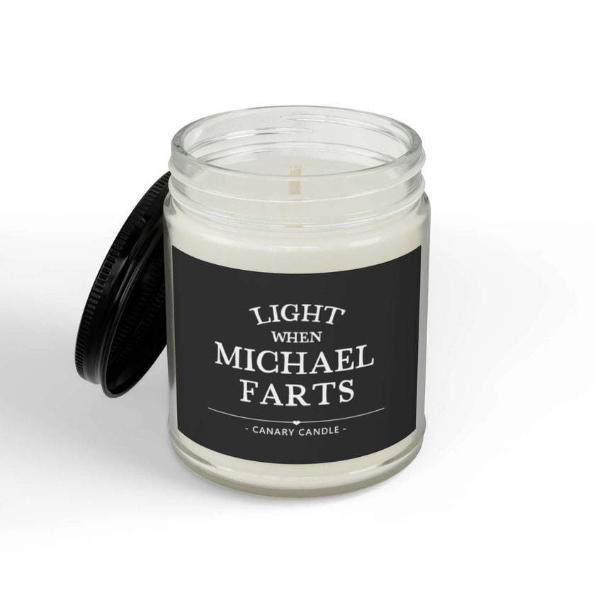 Funny personalized candle with a humorous label that says 'Light When Michael Farts' in a glass jar.