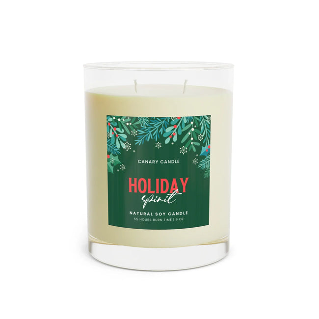 Holiday Spirit Scented Candle in clear glass jar with festive holiday design and two wicks for even burning.