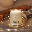 Forest Pine Soy Candle in a glass jar surrounded by fairy lights and a guitar.