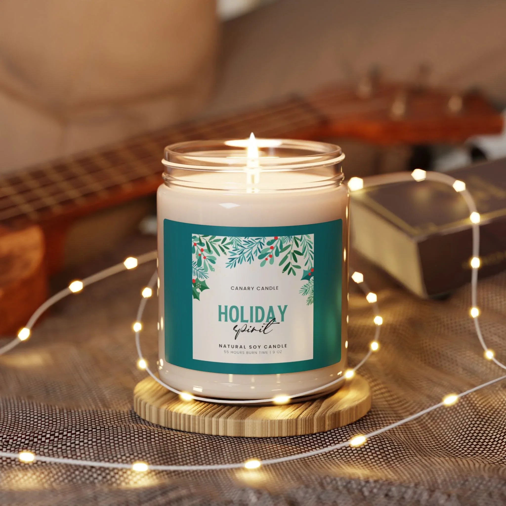 Natural Holiday Candle in a glass jar with a festive label, surrounded by string lights and a cozy atmosphere.