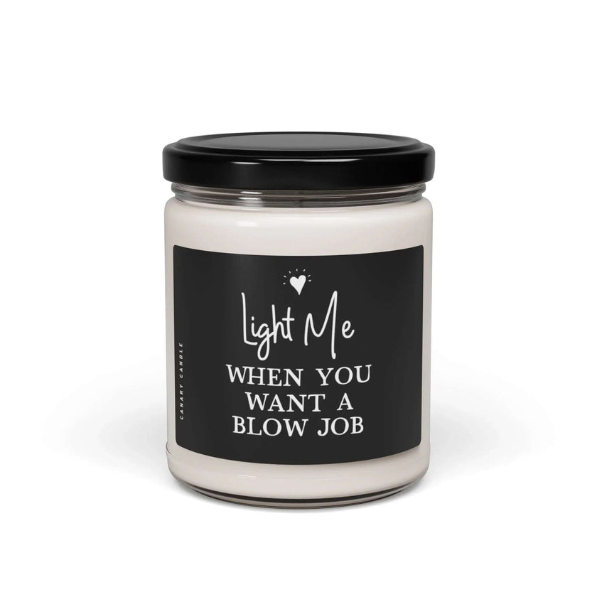 Naughty Soy Candle in a clear jar with a playful label saying 'Light Me When You Want A BJ'