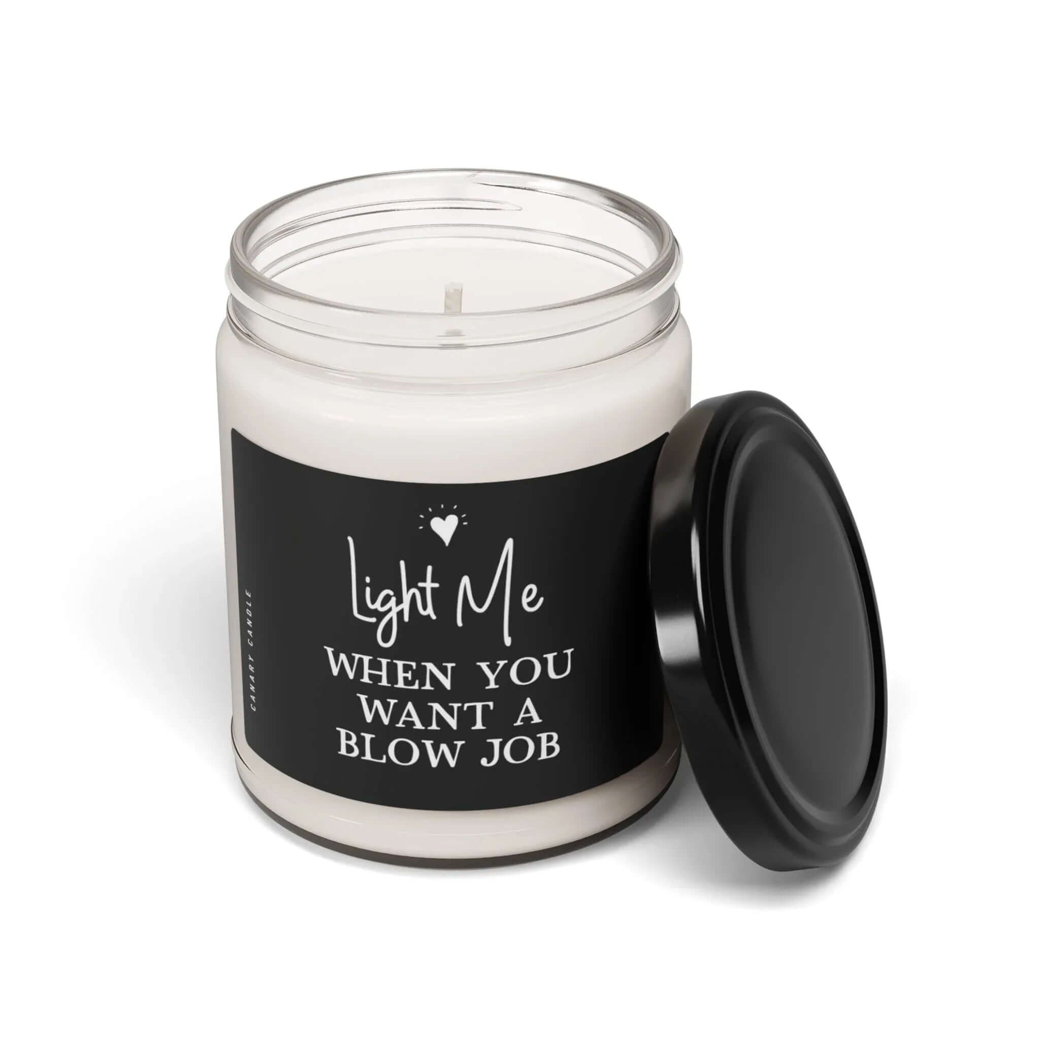 Naughty Soy Candle in glass jar with playful label Light Me When You Want A BJ, hand-poured for clean burning.