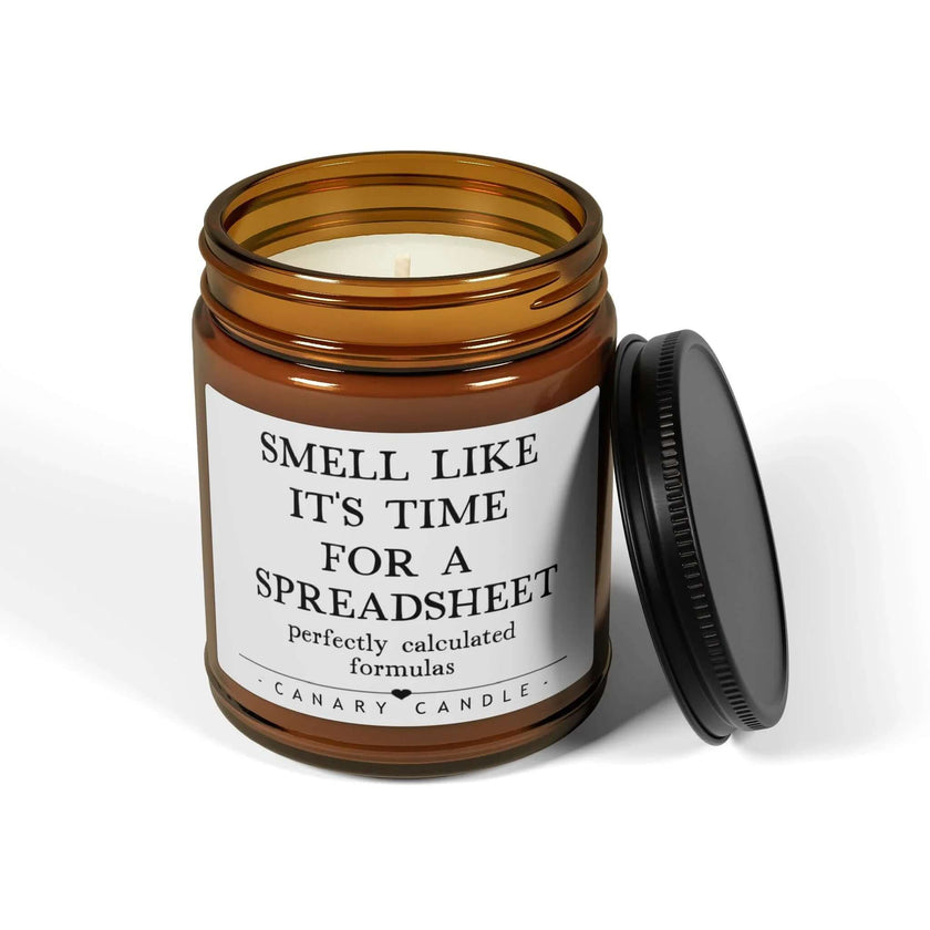 Scented soy candle in amber jar with black lid, ideal for a funny coworker gift.