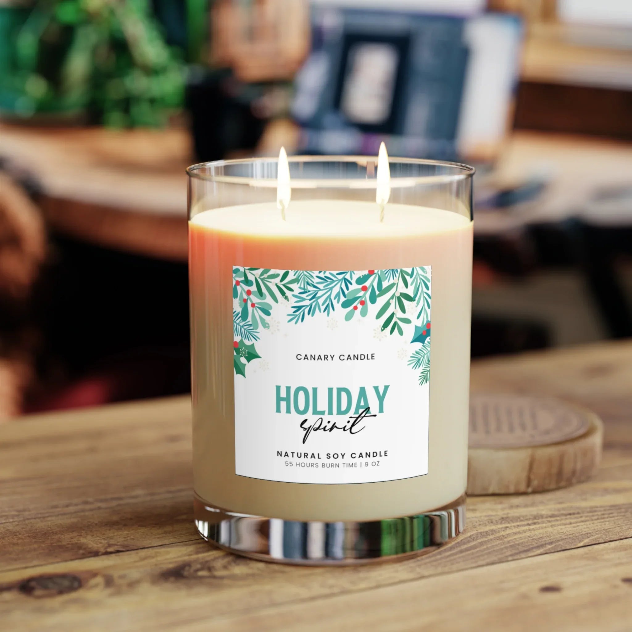 Holiday Spirit Scented Candle in a glass jar with two wicks, showcasing festive design and natural soy wax.