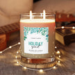 Holiday Spirit Scented Candle in a glass jar with double wicks and festive greenery design on the label.