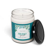 Natural Holiday Candle in a reusable glass jar with a black lid and festive label design.