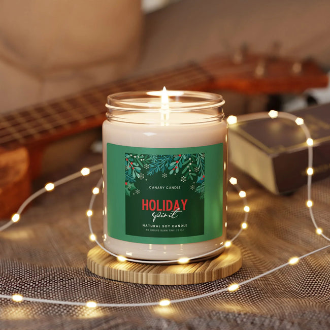 Holiday Spirit candle in reusable glass jar, surrounded by lights and guitar, exuding festive warmth.