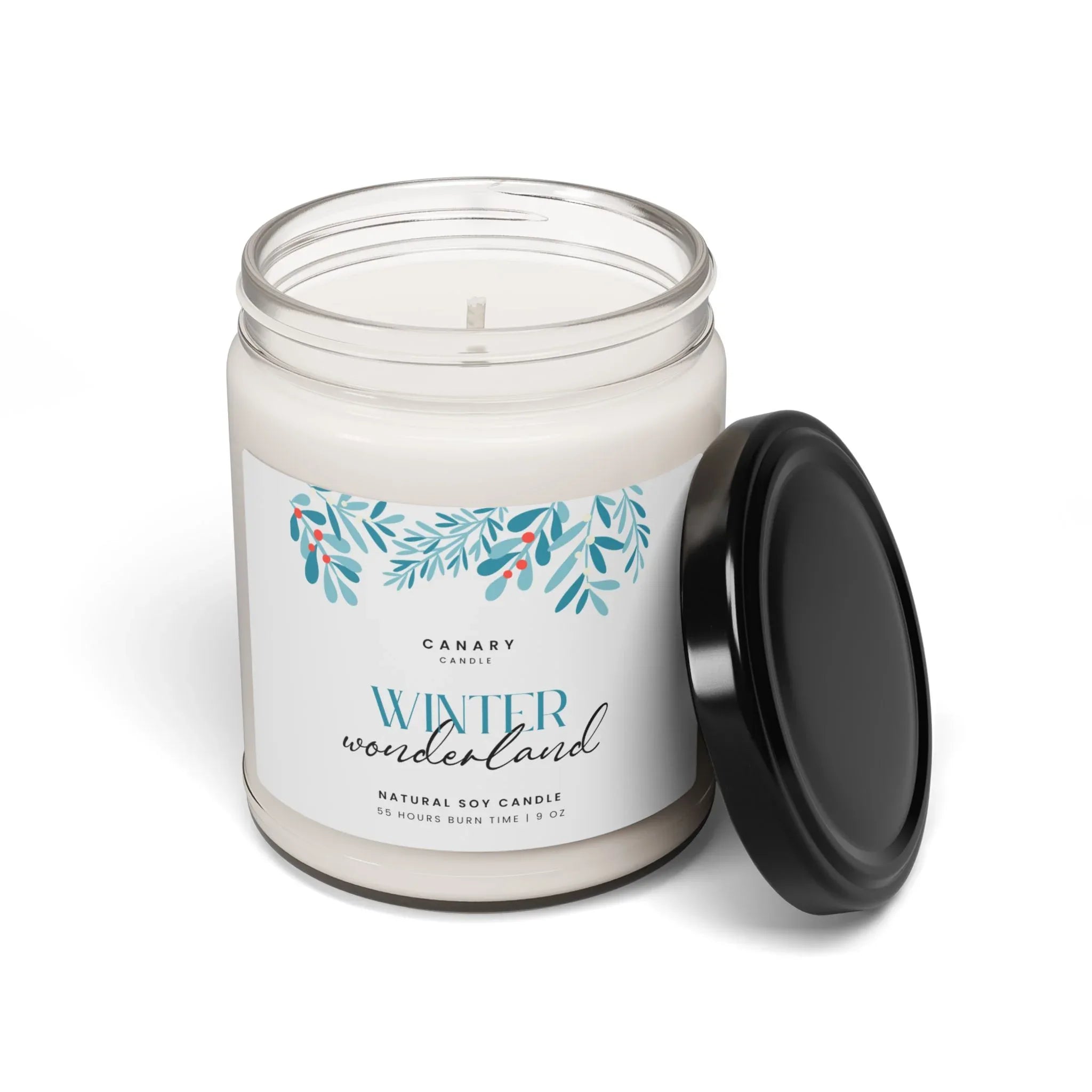 Holiday Aromatherapy candle in reusable glass jar with Winter Wonderland scent and black lid.