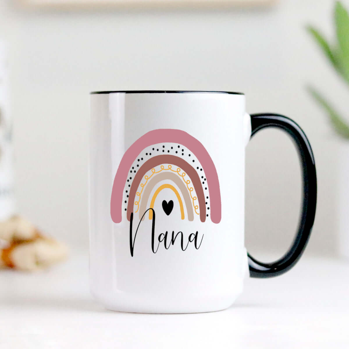 Nana mug featuring a colorful rainbow design, high-quality ceramic with a two-tone rim and dishwasher safe.