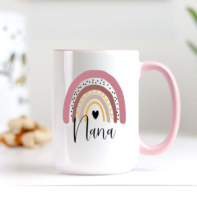 Nana mug with pink handle and rainbow design, high quality ceramic, perfect for gifts.