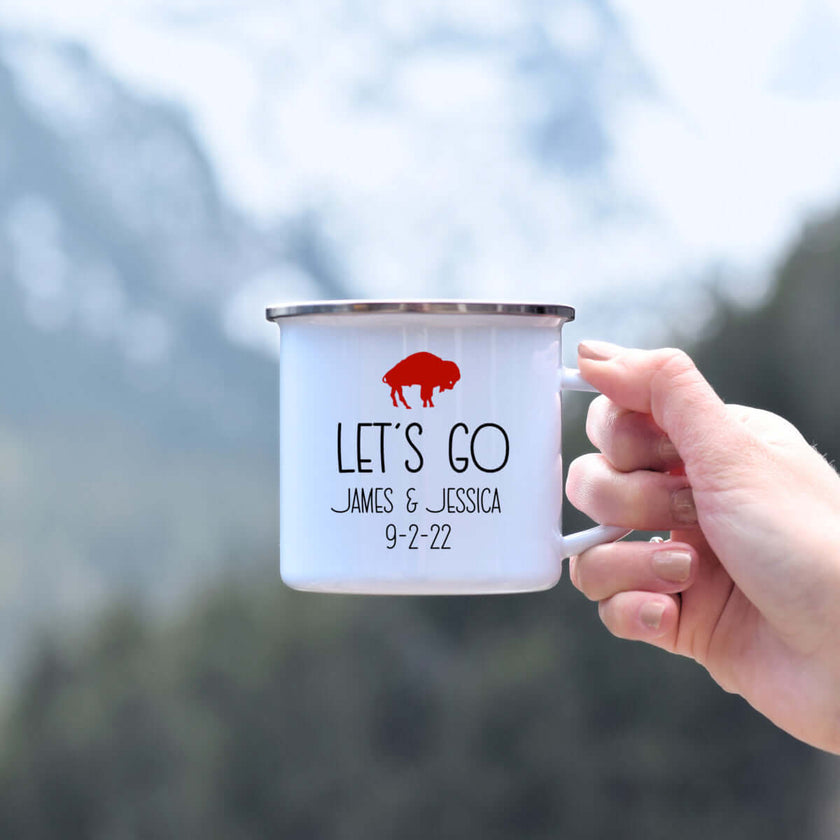 Personalized wedding gift - Let's go funny enamel mug with custom names and date, outdoor setting.